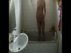 All natural non-professional Desi brunette takes a shower and flashes her intimate parts